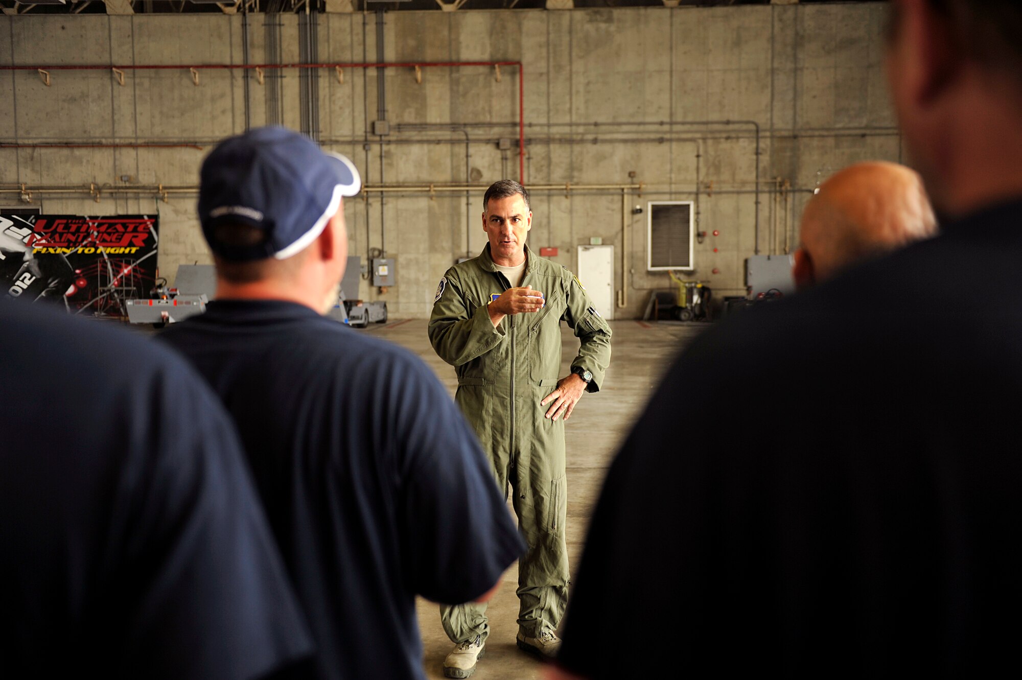 U.S. Air Force Col. Paul Johnson, 18th Operations Group deputy commander, thanks members of the 18th Maintenance Group and members of Boeing for their two-year F-15 Eagle modification program on Kadena Air Base, Japan, May 15, 2014. The program, which was implemented to upgrade the aircraft's radar systems, required replacement of the antenna, power supply and environmental control system. (U.S. Air Force photo by Naoto Anazawa)