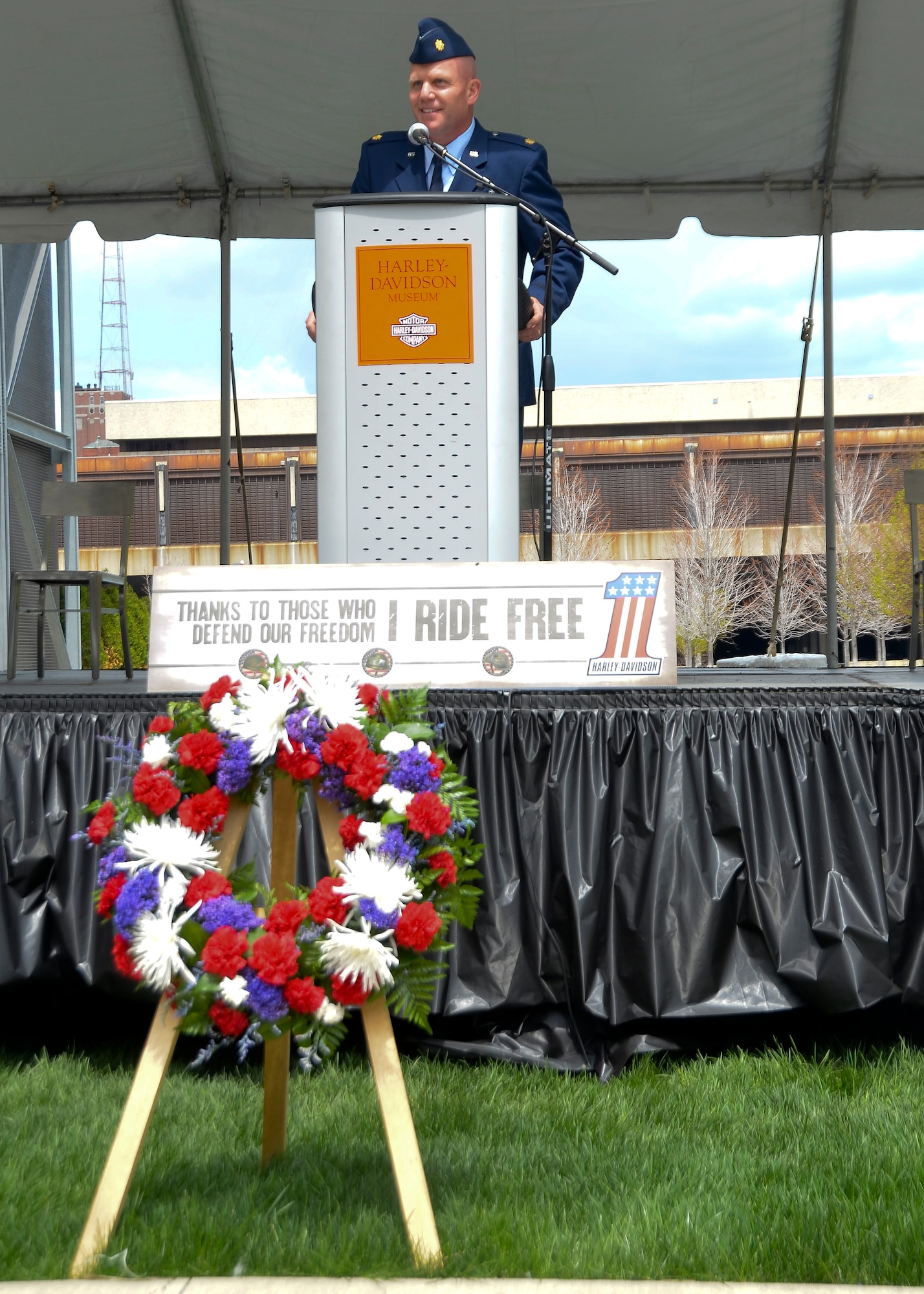 128th Air Refueling Wing Chaplain Maj. Mathew Friese provides the opening invocation for an Armed Forces Day event at the Harley-Davidson Museum, Milwaukee, May, 17, 2014. (U.S. Air National Guard photo by Airman Morgan R. Lipinski/Released)