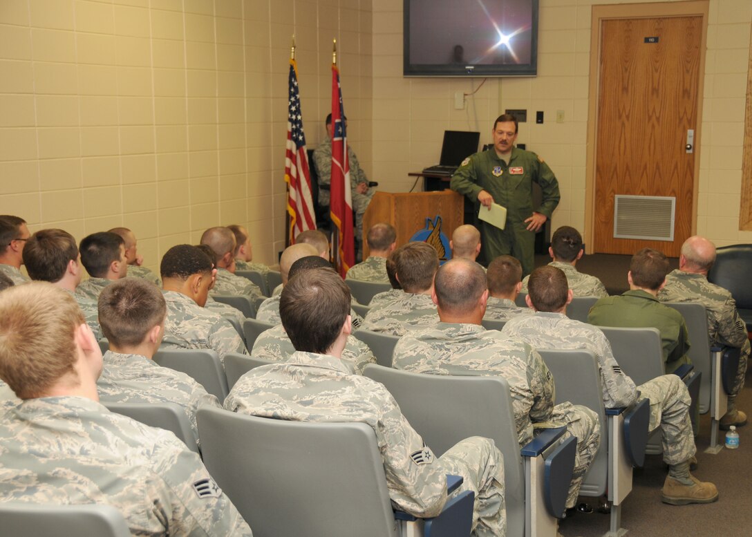 U.S. Air Force Col. Mike Nabors, commander of the 186th Air Refueling Wing, addresses airmen in the ranks of E1 – E4 during a commander’s briefing at Key Field Air National Guard Base, May 17, 2014.  Nabors’ briefing included the history of the 186th and an open forum for discussion.  (U.S. Air National Guard photo by Senior Airman Jessica Fielder/Released)