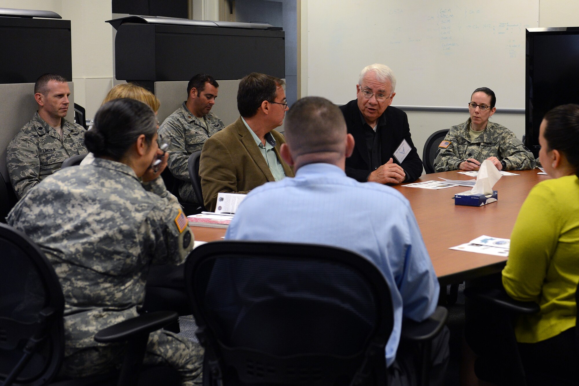 Dr. Bob Foster, Air Force Scientific Advisory Board member, speaks to victim advocates with the Sexual Harassment and Response Prevention program May 14, 2014, at Joint Base Lewis-McChord, Wash. The SAB members visited JBLM to gather relevant data in helping the Air Force more effectively address the sexual assault problem.  (U.S. Air Force photo/Airman 1st Class Jacob Jimenez)   