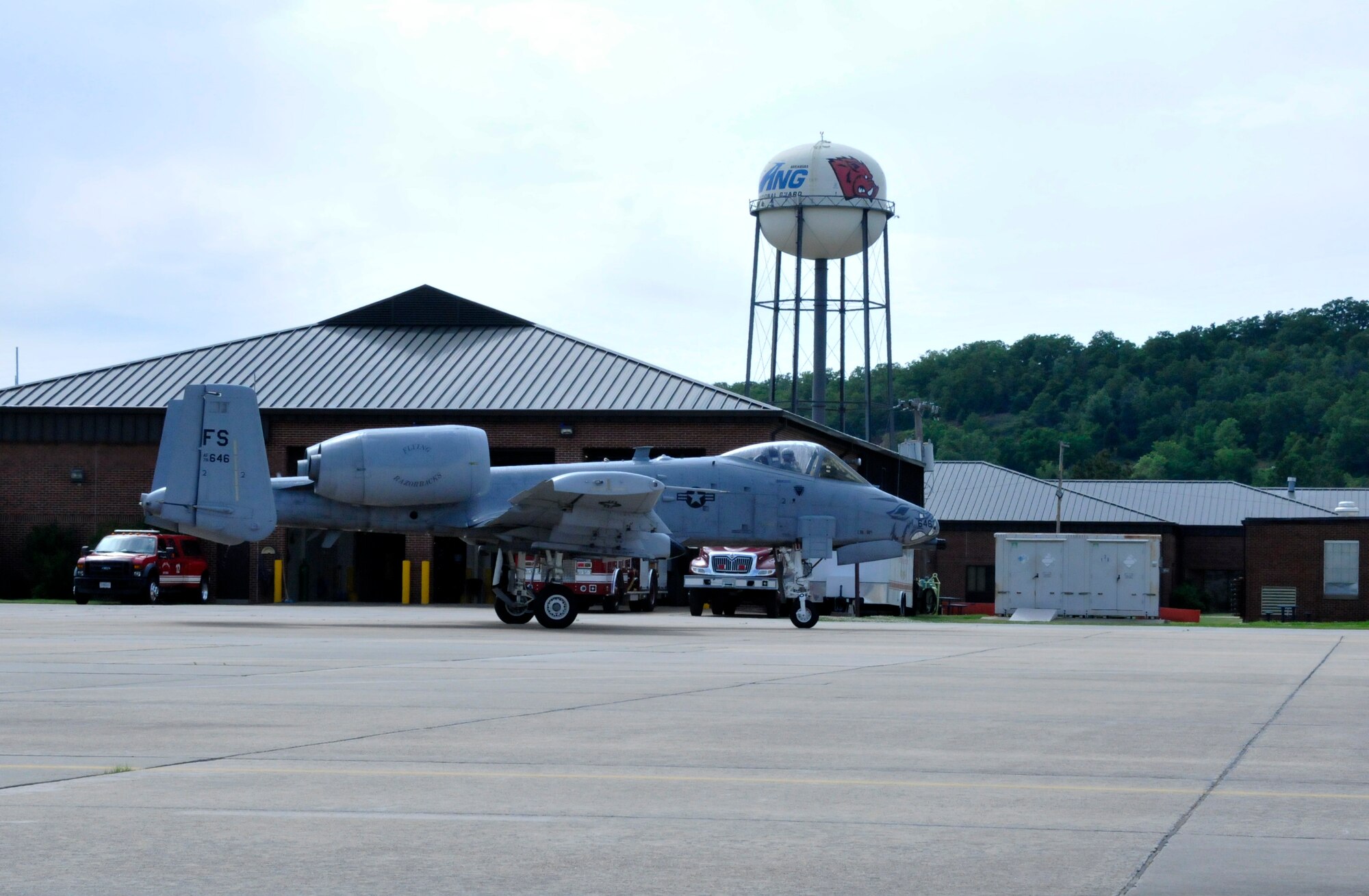 Maj. Doug Davis, 188th Detachment 1 commander, taxies on the ramp after flying the 188th Fighter Wing’s final A-10C Thunderbolt II “Warthog” training mission alongside Lt. Col. Marty Dahlem, 188th Operations Support Squadron commander, May 16, 2014, at Ebbing Air National Guard Base, Fort Smith, Arkansas. (U.S. Air National Guard photo by Tech Sgt. Josh Lewis/released)