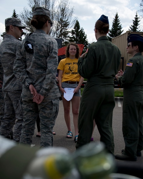 Airmen from the 133rd Airlift Wing talk to a potential new recruits in St. Paul, Minn., May 17, 2014. The 133rd Airlift Wing Recruiting Team hosted a Unit Referral Event, to give potential new recruits the chance to interact with unit that they are interested in joining. 

(U.S. Air National Guard photo by Tech. Sgt. Amy M. Lovgren/ Released) 
