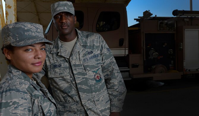 Senior Airmen Shawn and Hillary Brock are firefighters deployed to the 380th Expeditionary Civil Engineer Squadron from Misawa Air Base, Japan. The couple met in tech school in 2011, recently celebrated their first wedding anniversary. (U.S. Air Force photo/Tech. Sgt. Russ Scalf)