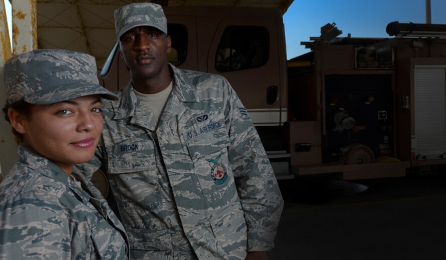 Senior Airmen Shawn and Hillary Brock are firefighters deployed to the 380th Expeditionary Civil Engineer Squadron from Misawa Air Base, Japan. The couple met in tech school in 2011, recently celebrated their first wedding anniversary. (U.S. Air Force photo/Tech. Sgt. Russ Scalf)