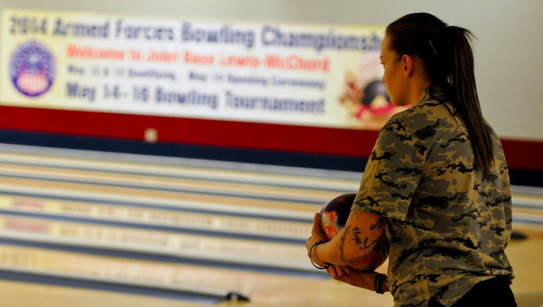 Sgt. Rose Brown, stationed at Fort Bliss, Texas, competes against the All-Air Force and All-Navy Bowling teams during the 2014 Armed Forces Bowling Championship at Bowl Arena Lanes on Joint Base Lewis-McChord, Wash., May 13. Soldiers from across the Army competed for a chance to bowl on the All-Army Bowling team against the All-Air Force and All-Navy teams.