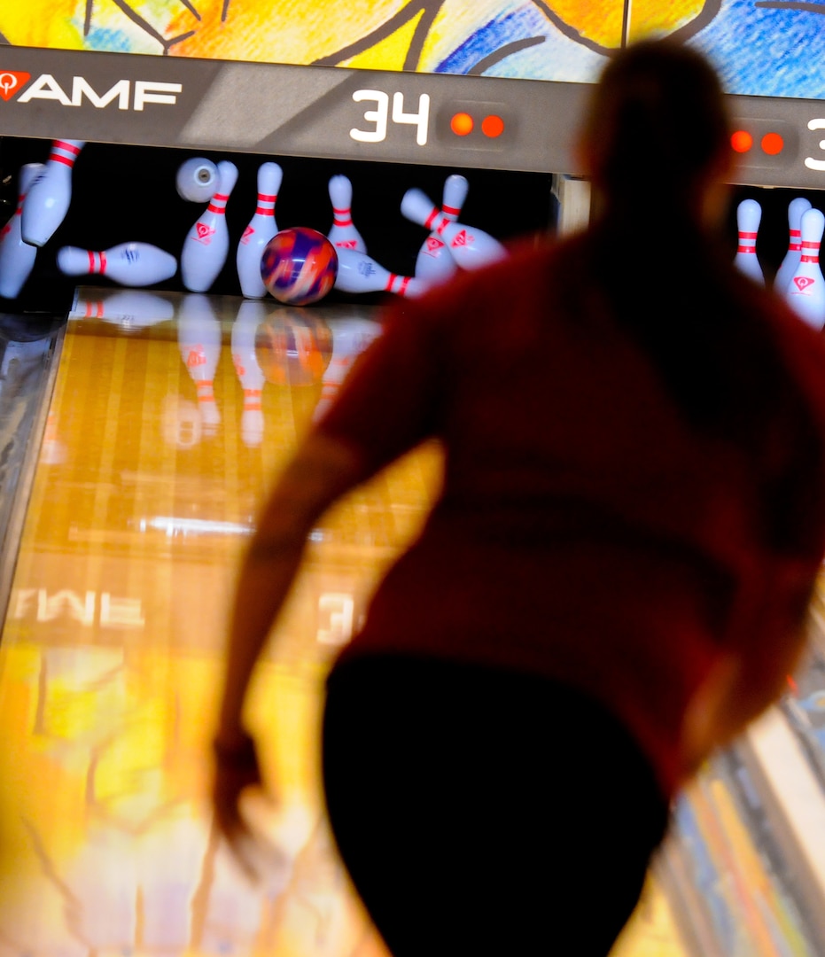 Sgt. Rose Brown, stationed at Fort Bliss, Texas, follows through while competing in a qualifying game to make the All-Army Bowling team during the 2014 Armed Forces Bowling Championship at Bowl Arena Lanes on Joint Base Lewis-McChord, Wash., May 13.  Soldiers from across the Army competed for a chance to bowl on the All-Army Bowling team against the All-Air Force and All-Navy teams.