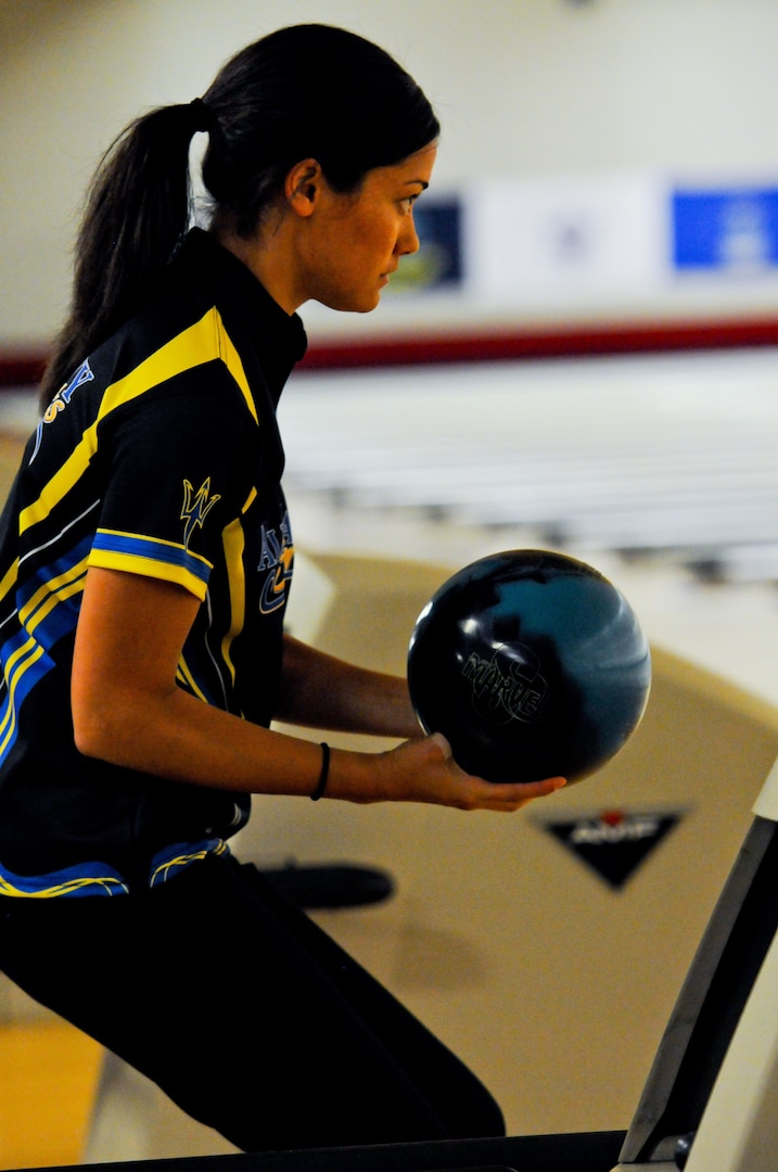 Navy Information Systems Technician 2nd Class Melanie Griffith competes against the All-Air Force and All-Army Bowling teams during the 2014 Armed Forces Bowling Championship at Bowl Arena Lanes on Joint Base Lewis-McChord, Wash., May 13.