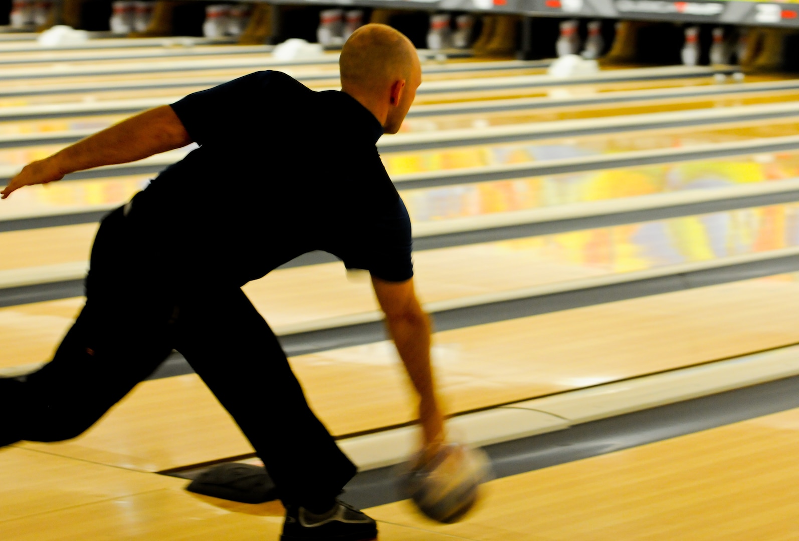 Air Force Staff Sgt. Kyle Wilkes, All-Air Force Bowling Team, competes against the All-Army and All-Navy Bowling Teams during the 2014 Armed Forces Bowling Championship at Joint Base Lewis-McChord, Wash., May 16.