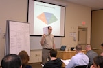 Army Capt. Paul Lepley, 126th Cavalry Squadron, Michigan National Guard, facilitates an Applied Suicide Intervention Skills Training course at Fort Custer Training Center, Battle Creek, Mich., on April 29, 2014. The course is part of the Army National Guard Ready and Resilient Campaign and is the first of three classes held this year to train Michigan Guard Soldiers and Airmen to recognize and intervene with members who are at risk for suicide.