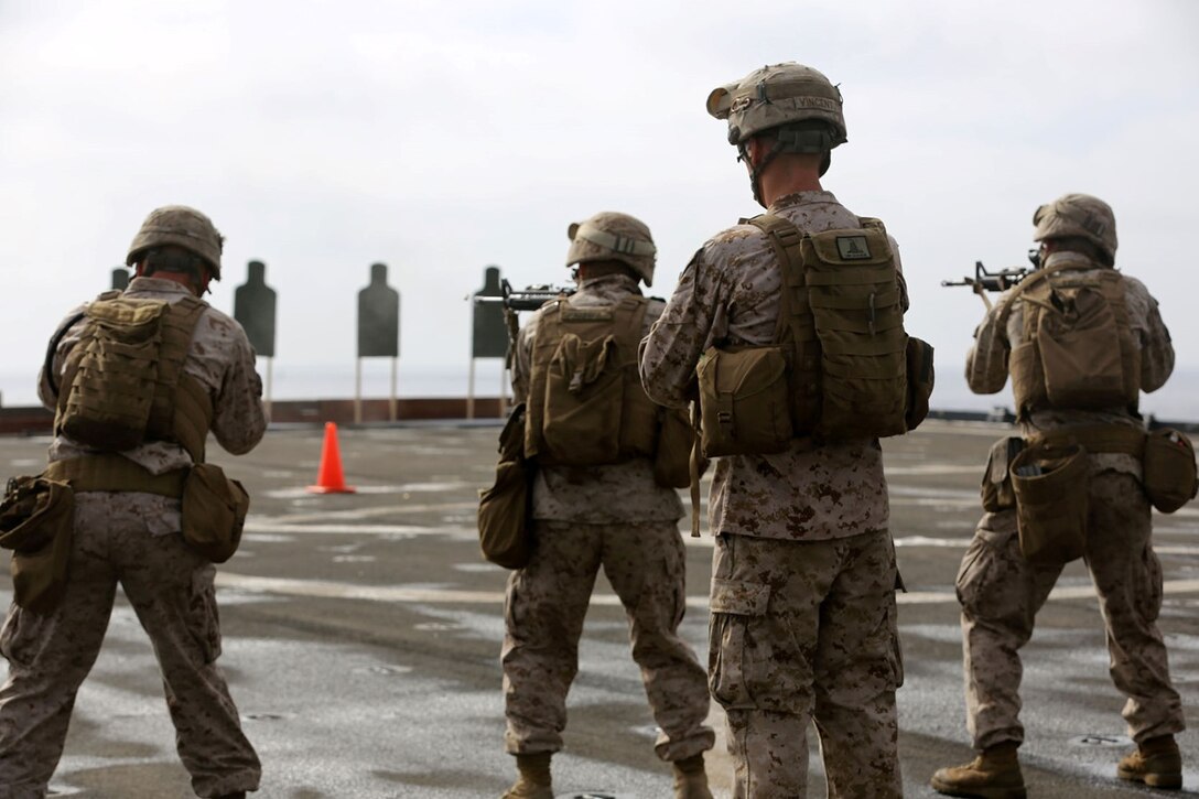 USS COMSTOCK, At Sea – Marines with Echo Company, Battalion Landing Team 2nd Battalion, 1st Marines (BLT 2/1), 11th Marine Expeditionary Unit, engage targets while conducting a Table 3 course of fire during Composite Training Unit Exercise (COMPTUEX) aboard the USS Comstock May 17. COMPTUEX is the second at-sea event in the 11th MEU and Makin Island Amphibious Ready Group joint predeployment training program, during which they will refine mission-related operations and blue-green communication. (U.S. Marine Corps photo by Sgt. Melissa Wenger/Released)