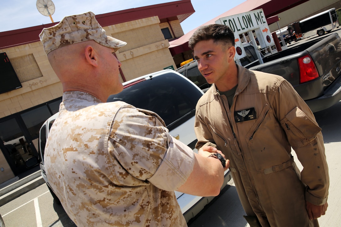 The 35th Commandant of the Marine Corps General James F. Amos, the 17th Sergeant Major of the Marine Corps Sgt. Maj. Micheal P. Barrett visit Marine Corps Base Camp Pendleton to speak with Marines who participated in firefighting efforts during the Basilone Complex Fire. The Marines worked day and night on the ground and in the air to combat the multiple blazes across the base.