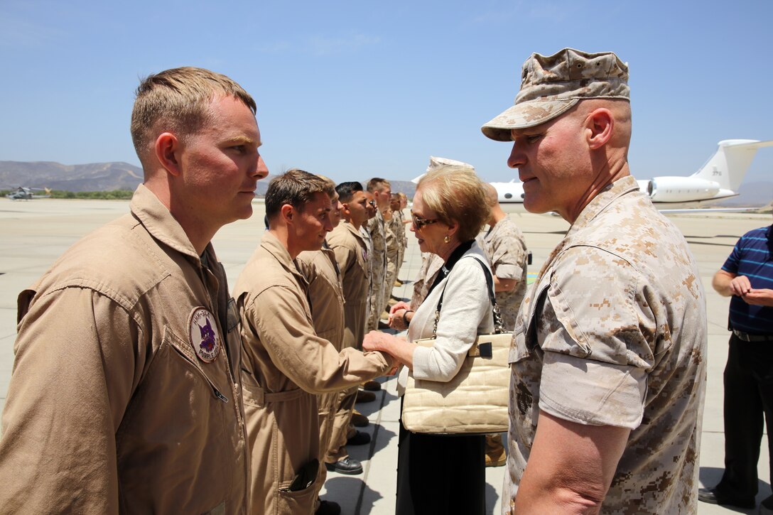 The 35th Commandant of the Marine Corps General James F. Amos, the 17th Sergeant Major of the Marine Corps Sgt. Maj. Micheal P. Barrett visit Marine Corps Base Camp Pendleton to speak with Marines who participated in firefighting efforts during the Basilone Complex Fire. The Marines worked day and night on the ground and in the air to combat the multiple blazes across the base.