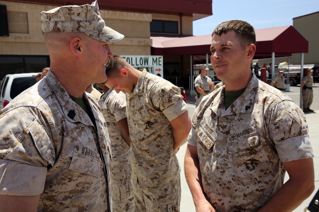 The 35th Commandant of the Marine Corps General James F. Amos, the 17th Sergeant Major of the Marine Corps Sgt. Maj. Micheal P. Barrett visit Marine Corps Base Camp Pendleton to speak with Marines who participated in firefighting efforts during the Basilone Complex Fire. The Marines worked day and night on the ground and in the air to combat the multiple blazes across the base.