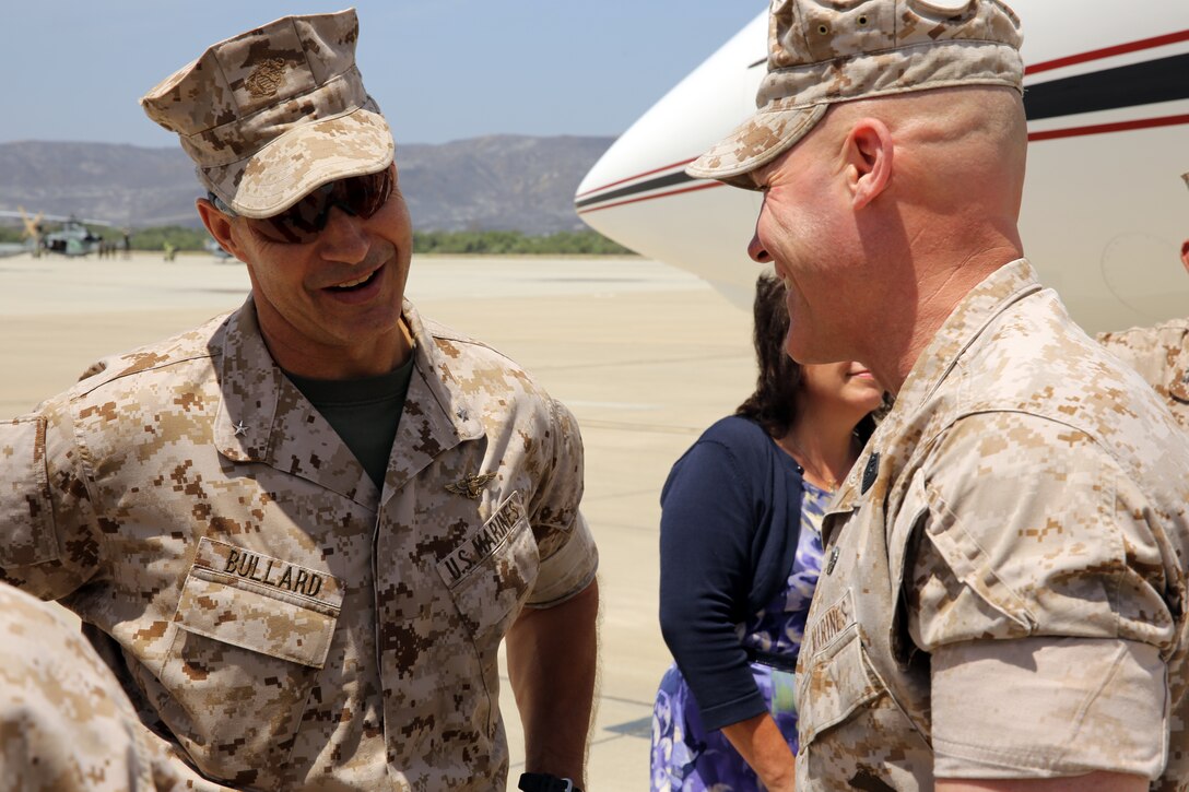 The 35th Commandant of the Marine Corps General James F. Amos, the 17th Sergeant Major of the Marine Corps Sgt. Maj. Micheal P. Barrett visit Marine Corps Base Camp Pendleton to speak with Marines who participated in firefighting efforts during the Basilone Complex Fire. The Marines worked day and night on the ground and in the air to combat the multiple blazes across the base.