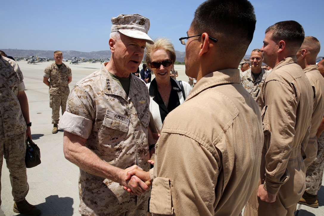 The 35th Commandant of the Marine Corps General James F. Amos, the 17th Sergeant Major of the Marine Corps Sgt. Maj. Micheal P. Barrett visit Marine Corps Base Camp Pendleton to speak with Marines who participated in firefighting efforts during the Basilone Complex Fire. The Marines worked day and night on the ground and in the air to combat the multiple blazes across the base.