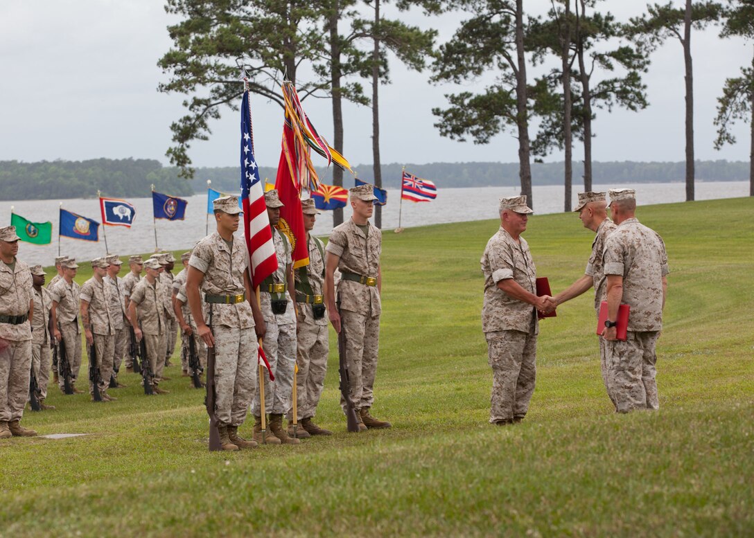 The Assistant Commandant of the Marine Corps, Gen. John M. Paxton, Jr., not shown, attends the retirement ceremony in honor of Maj. Gen. Charles M. Gurganus at Marine Corps Base Camp Lejeune, NC, May 15, 2014. (U.S. Marine Corps photo by Cpl. Tia Dufour/Released)