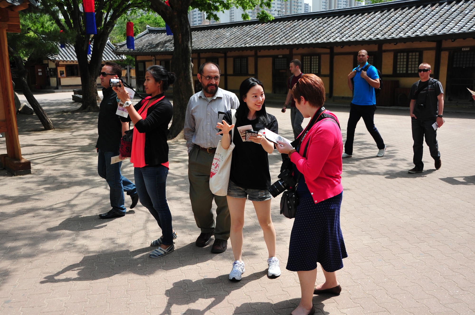 Head Start students tour the Korean Folk Village with Pyeongtaek University students as part of their immersion into Korean history and culture May 16, 2014.  The class is divided into three days. The first two days are spent in a classroom environment where students learn about Korean history, culture and language. The third day is a trip to cultural or historical site such as the Korean Folk Village or the DMZ. The class is taught by instructors at Pyeongtaek University and funded completely by the government of Gyeonggi-do. (U.S. Air Force photo by Tech. Sgt. Thomas J. Doscher)