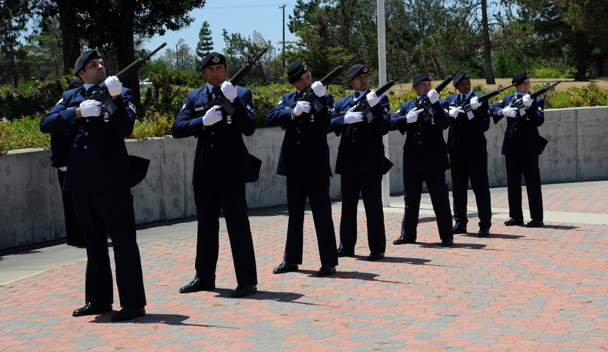 Members of the 30th Security Forces Squadron render a 21 gun salute during the Police Week Closing Ceremony, May 16, 2014, Vandenberg Air Force Base, Calif. This year Staff Sgt. Todd Lobraico was honored as his name was added among those who gave their lives in the line of duty. Lobraico, lost his life while deployed in Southwest Asia. (U.S. Air Force photo by Tech Sgt. Tyrona Lawson/Released)