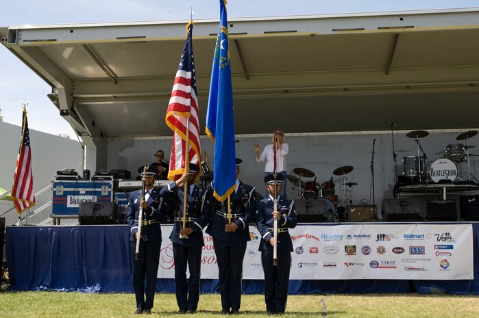 The Nellis Air Force Base Honor Guard, post the colors during the inaugural Nellis, Creech and Military Veterans Appreciation Day at Craig Ranch Park May 17, 2014, in North Las Vegas. The honor guard represents the Air Force in ceremonial functions throughout southern Nevada, Arizona, Utah and some areas of California. (U.S. Air Force photo by Senior Airman Christopher Tam)