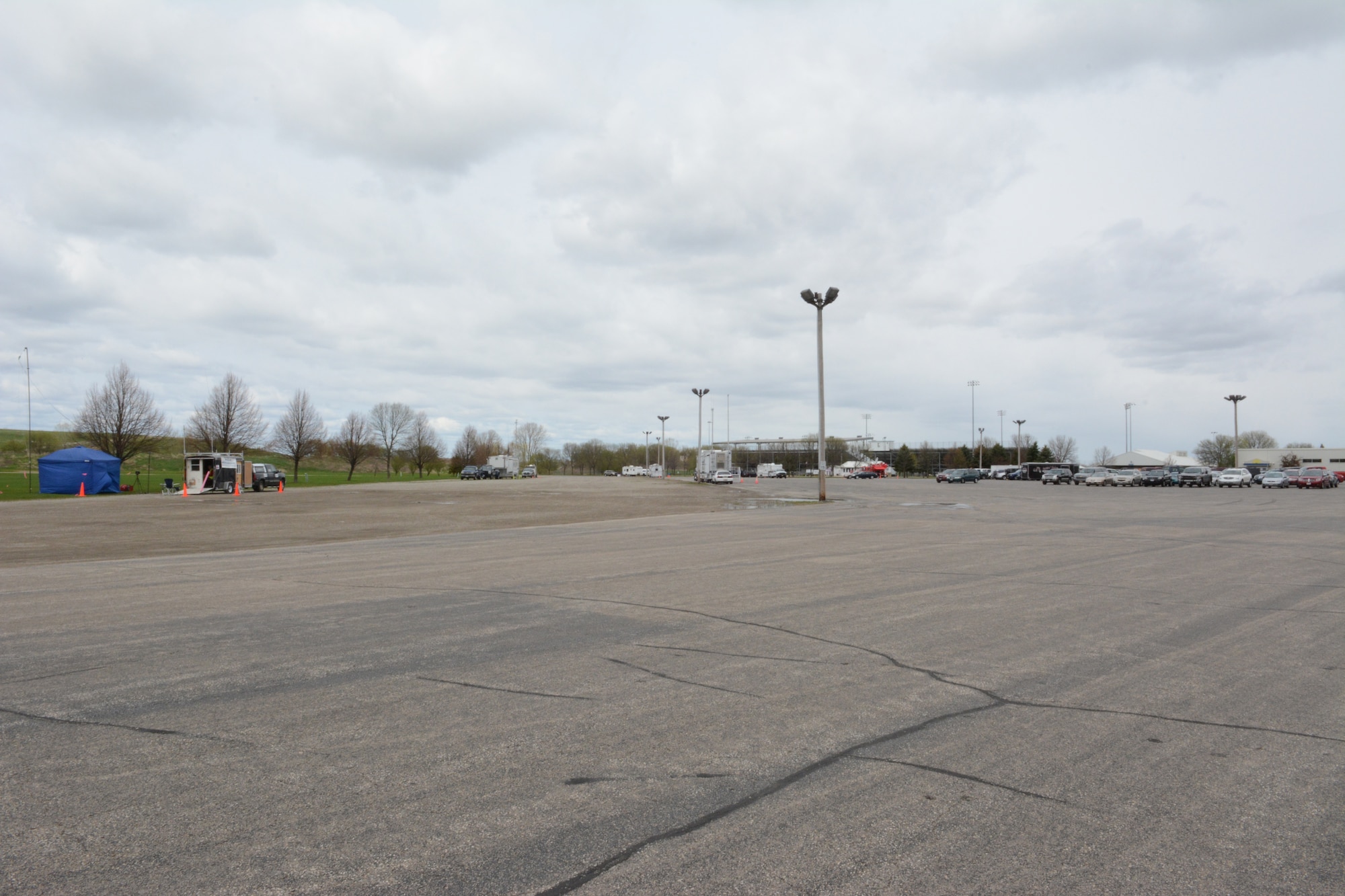 Mobile communication units were spread across the Sunnyview Exposition Center parking lot during the 2014 State Interoperable Mobile Communications Exercise in Oshkosh, Wis., May 15, 2014. More than 100 agencies from 34 communication platforms were in attendance. Members of the Wisconsin National Guard tested their ability to communicate with other agencies to ensure everything worked properly should an emergency situation arise. (Air National Guard photo by Senior Airman Andrea F. Liechti)