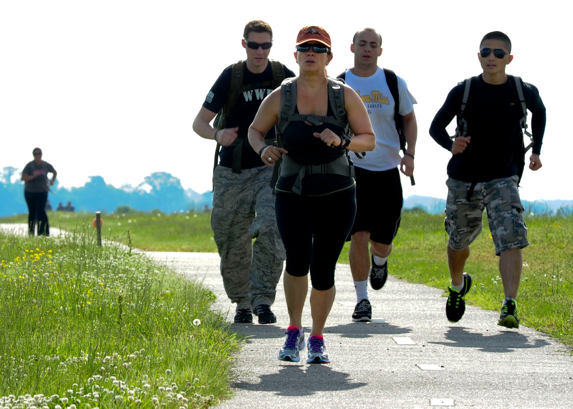 Service members from Joint Base Langley-Eustis, Va., participate in the Rucking for Veterans 5K at Langley Air Force Base, May 17, 2014. Proceeds from the event support the Wounded Warrior Project which honors and empowers wounded warriors. (U.S. Air Force photo by Airman 1st Class Areca T. Wilson/Released)