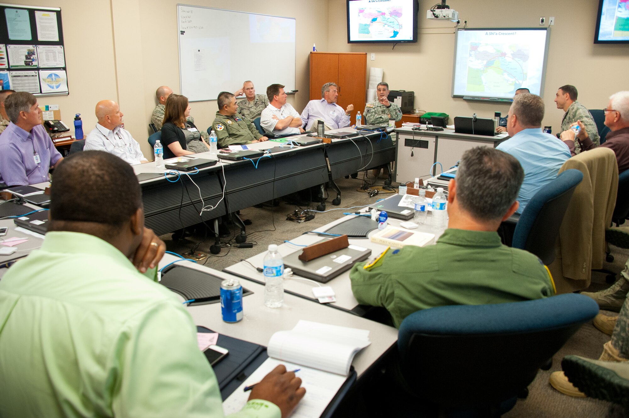 Civilian guests attending the 61st National Security Forum join American and international officers attending the Air War College in seminar discussions about topics such as ethics, strategy and cyber awareness, May 7, 2014, at Maxwell Air Force Base, Ala. (U.S. Air Force photo/Melanie Rodgers Cox)