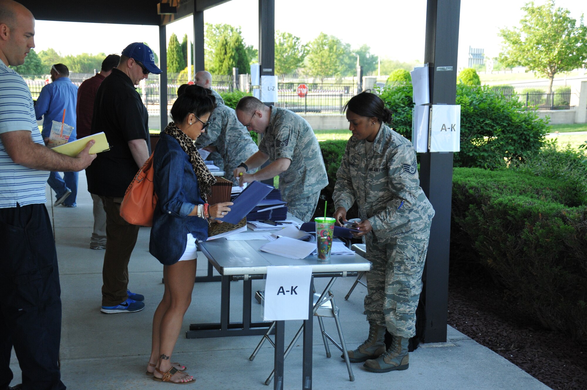 Reservists from the 512th Force Support Squadron assist more than 170 Air Force Individual Ready Reserve members reporting to an IRR muster May 17, 2014, at Dover Air Force Base, Del. The muster provided opportunities for IRR Airmen to update their personnel and medical information with the Air Reserve Personnel Center and learn the latest information on available benefits. (U.S. Air Force photo/Herbert E. Welday III)
