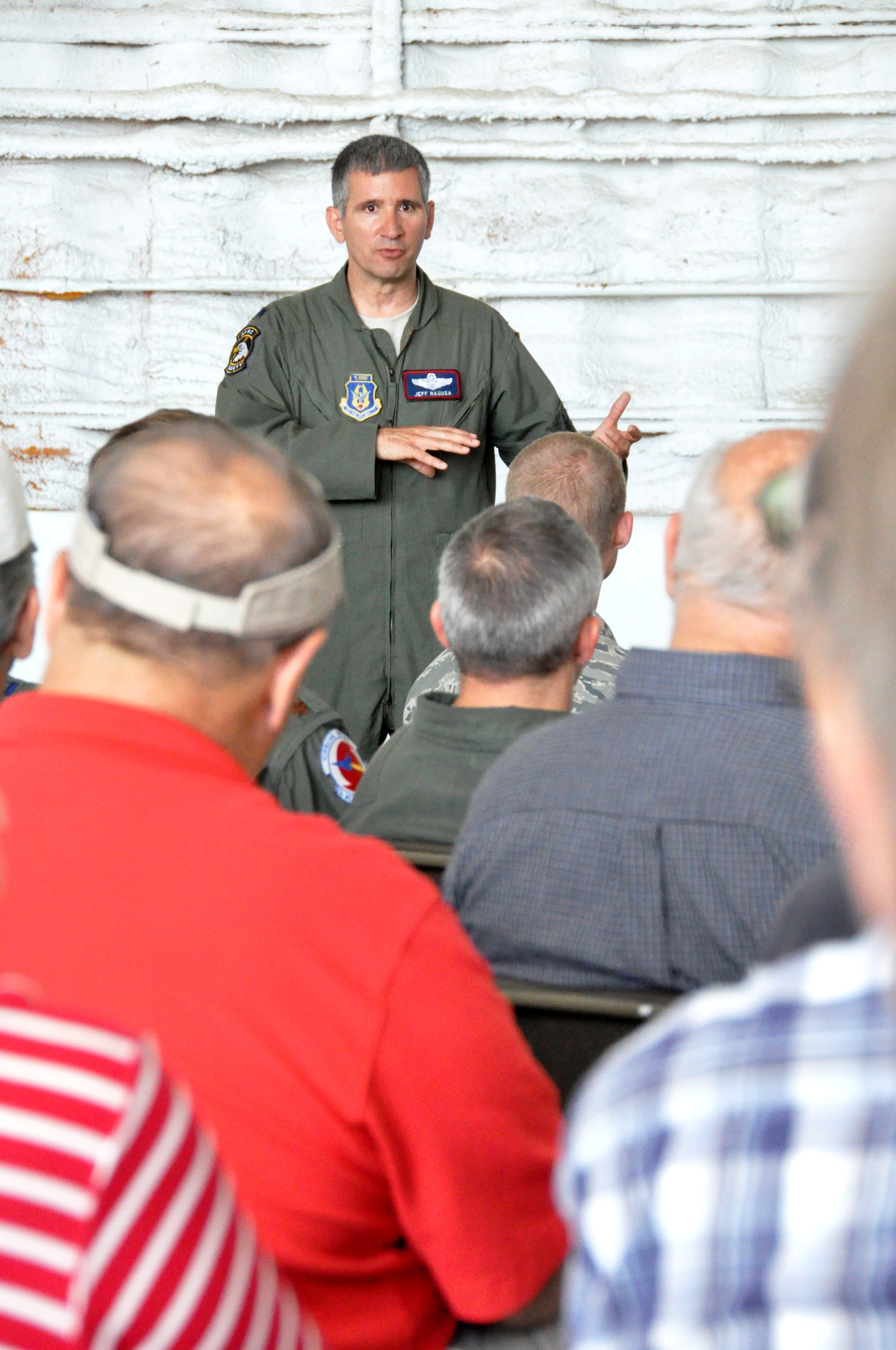 Lt. Col. Jeff Ragusa, the 403rd Wing chief of safety, briefs participants on air traffic patterns around Keesler Air Force Base during the Military and Civilian Aviation Safety Day at Stennis International Airport May 16 2014. Military and civilian aviators from the area flew in to Stennis for a day of briefings and professional networking.