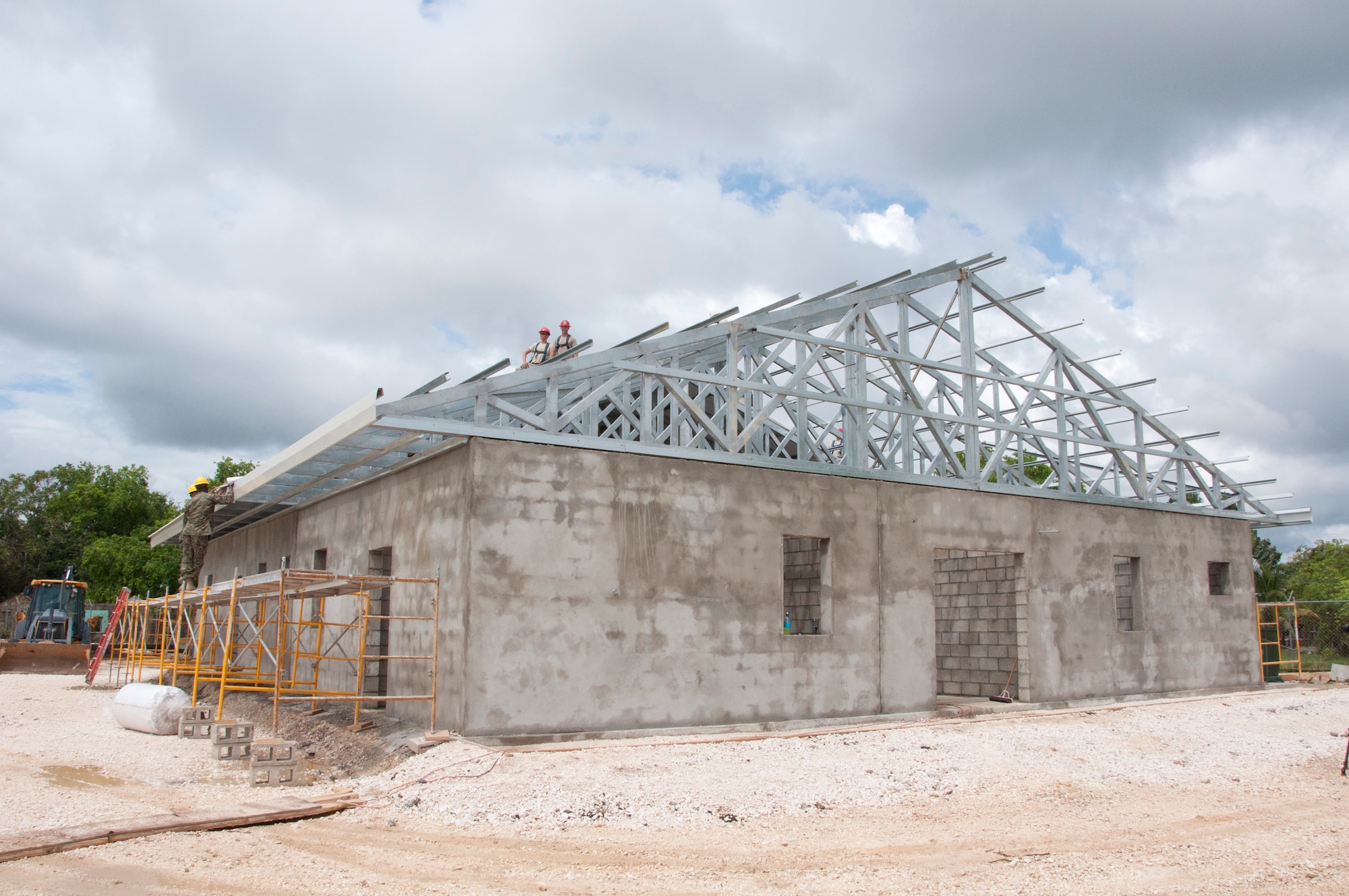 An addition to the Hattieville Government School is nearing completion after nearly six weeks of construction May 16, 2014, in Hattieville, Belize. Members of the Belize Defence Force Light Engineer Company have been working alongside U.S. Air Force, Army and Marine engineers on additions at four schools and one medical facility throughout Belize as part of New Horizons Belize 2014. (U.S. Air Force photo by Tech. Sgt. Kali L. Gradishar/Released)