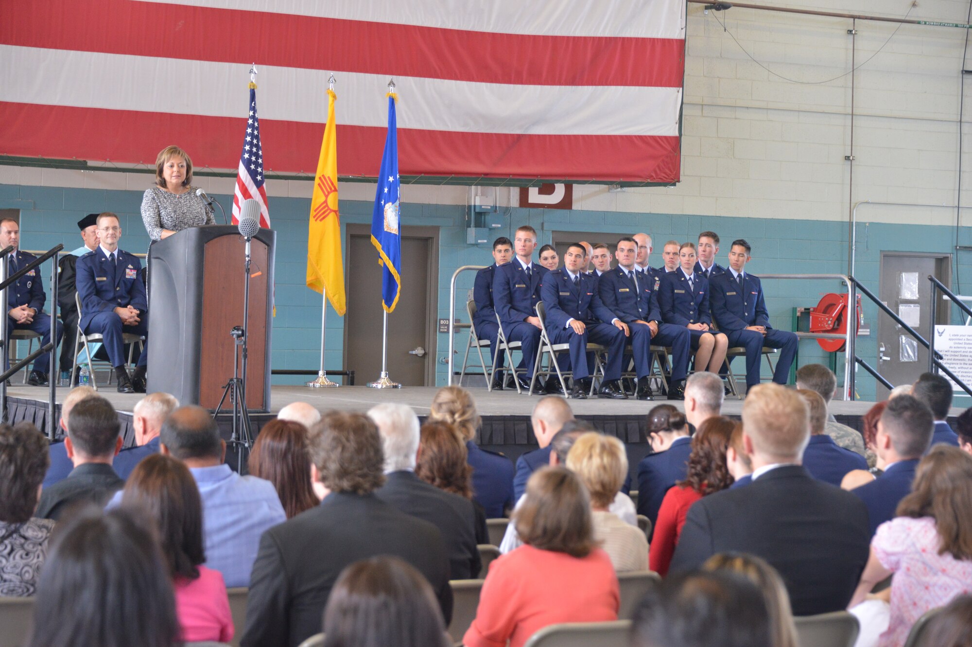 Twelve Air Force ROTC cadets from Detachment 510 at the University of New Mexico received their diplomas and were commissioned as second lieutenants in a ceremony May 16 at Kirtland's Hangar 1000. Guest speakers were New Mexico Governor Susana Martinez (pictured) and Brig. Gen. Mark McLeod, the director for logistics, engineering and security cooperation, U.S. Pacific Command, Camp H.M. Smith, Hawaii. 

The new officers are 2nd Lt. Adrian T. Archibeque; 2nd Lt. Nicolas T. Austin; 2nd Lt. Rebecca Billison; 2nd Lt. Caleb G. Cionelo; 2nd Lt. Gerald A. Feltman; 2nd Lt. Jeffery Gilmour; 2nd Lt. Marc Lane; 2nd Lt. Christopher M. McLeod; 2nd Lt. Adrian A. Nuanes-Lucero; 2nd Lt. Mariana F. Rael; 2nd Lt. Kyle Trafton; and 2nd Lt. Daniel Vortolomei.  (Photo by Todd Berenger)
