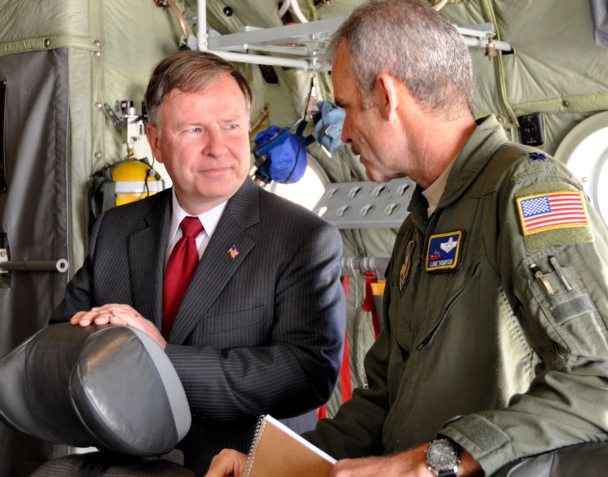 PETERSON AIR FORCE BASE, Colo. - Representative Doug Lamborn, Colorado’s 5th Congressional District, tours a Modular Airborne Fire Fighting System-equipped C-130H with Lt. Col. Luke Thompson, 302nd Airlift Wing’s chief of aerial firefighting May 14, 2014 here. Lamborn visited the Air Force Reserve Command’s 302nd AW to learn about this year’s training and certification preparation and to thank the Airmen for their contributions to the MAFFS program. Since the congressman’s last visit the wing has upgraded to the MAFFS II system from the legacy unit. (U.S. Air Force photo/Master Sgt. Daniel Butterfield)