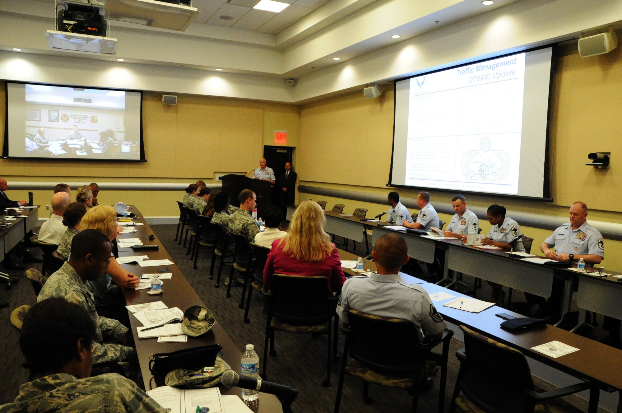 Chief Master Sgt. Dennis Beougher, Head Quarters Air Force Traffic Management functional area manager, answers questions during the career field managers' panel discussion for the 2014 Logistics Readiness Forum on Joint Base Andrews, Md., May 13, 2014. The forum invited National Captial Region logistics career field leaders to discuss joint service programs and total force development. (U.S. Air Force photo/Staff Sgt. Matt Davis)