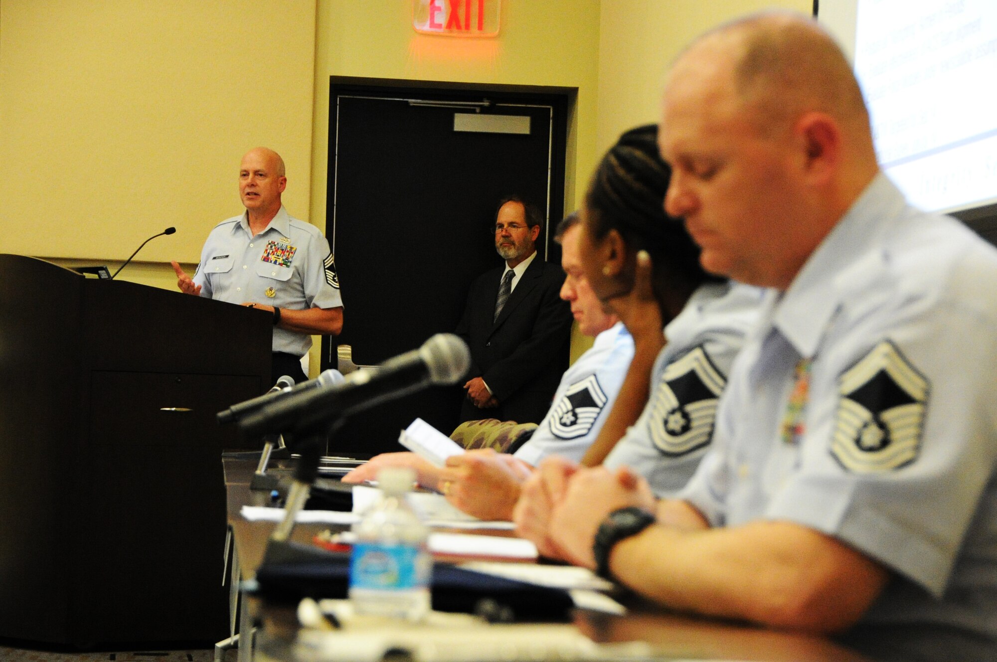 Chief Master Sgt. Dennis Beougher, Head Quarters Air Force Traffic Management functional area manager, answers questions during the career field managers' panel discussion for the 2014 Logistics Readiness Forum on Joint Base Andrews, Md., May 13, 2014. The forum invited National Captial Region logistics career field leaders to discuss joint service programs and total force development. (U.S. Air Force photo/Staff Sgt. Matt Davis)