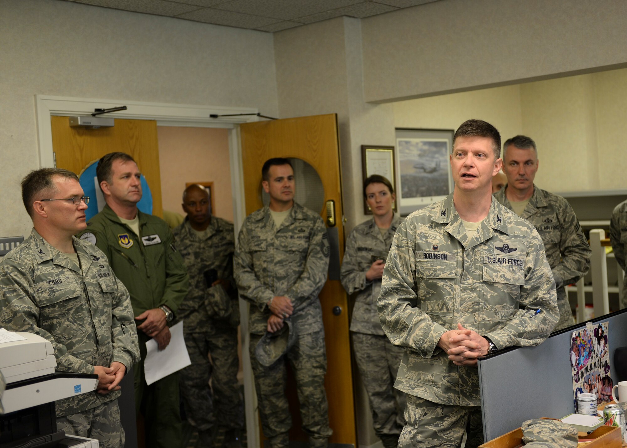 Col. Kyle Robinson, 48th Fighter Wing commander, thanks the base inspection team for their work throughout the wing’s two-year Unit Effectiveness Inspection May 19, 2014. The UEI ultimately resulted in an overall rating of ‘Highly Effective’ for RAF Lakenheath. (U.S. Air Force photo by Airman 1st Class Nigel Sandridge/Released)