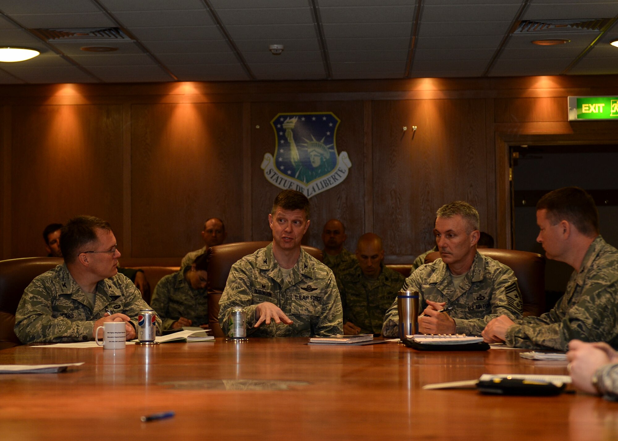 Col. Kyle Robinson, 48th Fighter Wing commander, delivers positive remarks about the 48th FW’s Unit Effectiveness Inspection on Royal Air Force Lakenheath, England, May 19, 2014. The two-year UEI ultimately resulted in an overall rating of ‘Highly Effective’ for RAF Lakenheath. (U.S. Air Force photo by Airman 1st Class Nigel Sandridge/Released