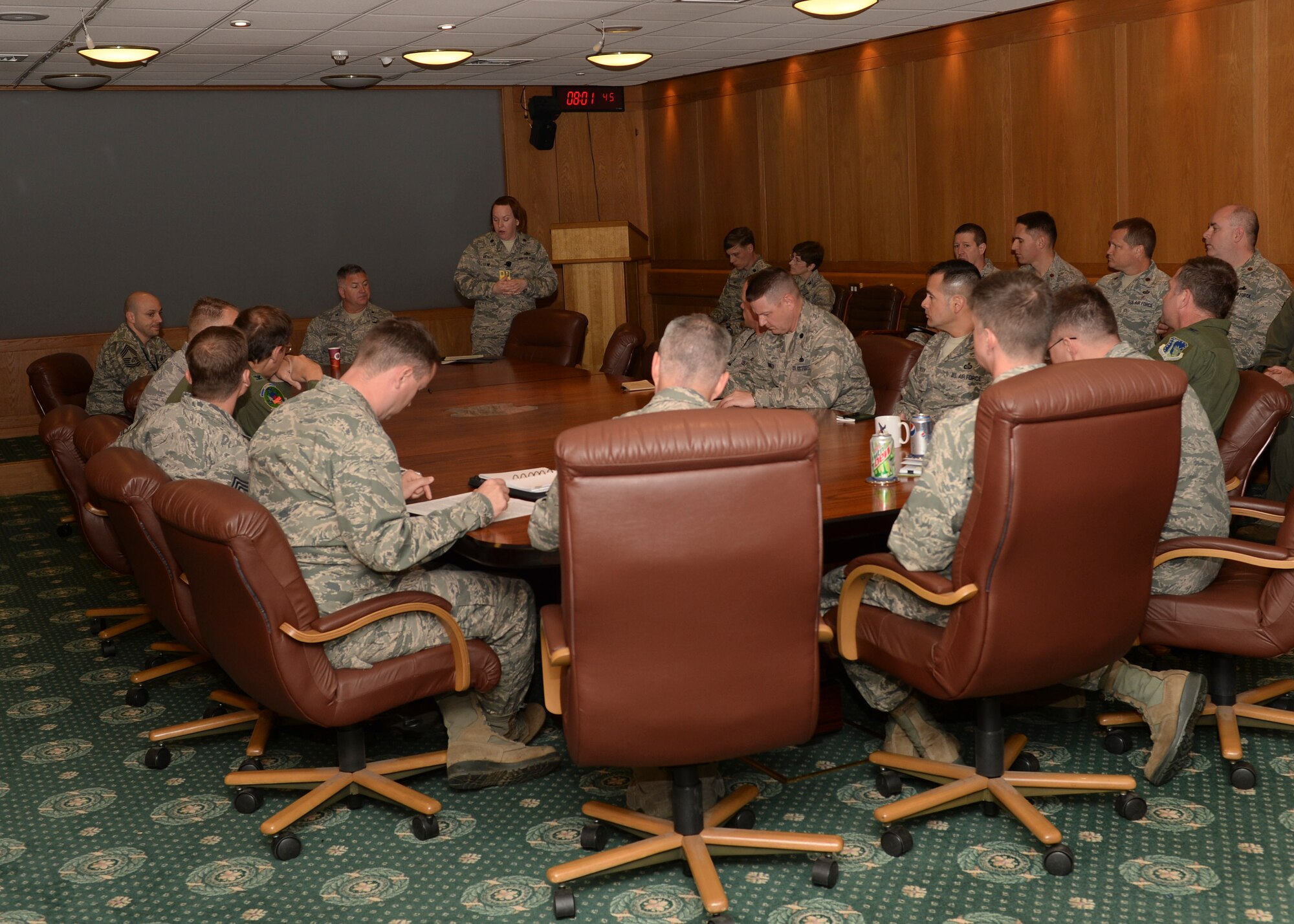 Lt. Col. April Mench, U.S. Air Forces in Europe inspector, gives the results of the 48th Fighter Wing’s Unit Effectiveness Inspection on Royal Air Force Lakenheath, England, May 19, 2014. The two-year UEI ultimately resulted in an overall rating of ‘Highly Effective’ for RAF Lakenheath. (U.S. Air Force photo by Airman 1st Class Nigel Sandridge/Released)