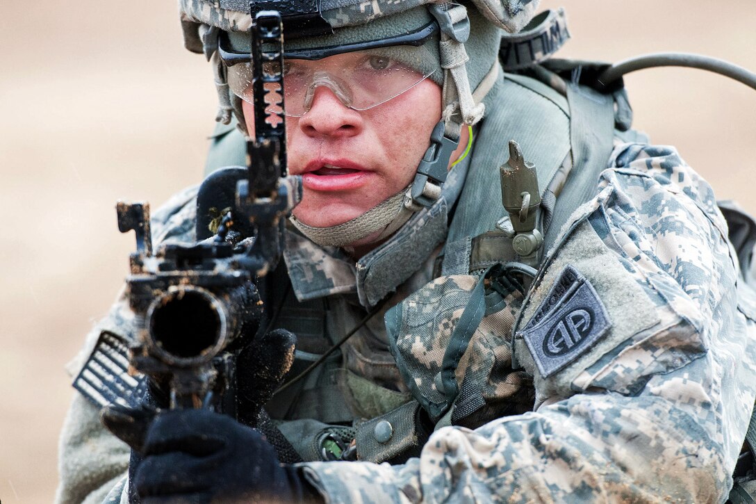 Army Pfc. Travis Williams aims his M320 grenade launcher during a training exercise on Fort Bragg, N.C., March 24, 2013. Williams, a grenadier, is assigned to the 82nd Airborne Division’s Company D, 2nd Battalion, 504th Parachute Infantry Regiment, 1st Brigade Combat Team.  
