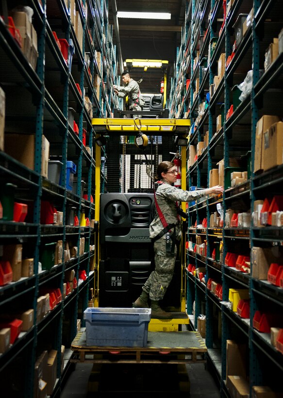 Airmen 1st Class Andrea Dalton and Yenliang Lin, of the 325th Logistics Readiness Squadron, train on the Hyster lifter at the 96th Logistics Readiness Squadron’s supply warehouse May 15 on Eglin Air Force Base, Fla.  Dalton and Lin are two of 13 LRS Airmen from Tyndall AFB to receive hands-on skills training from the materiel management flight’s “Supply University.”  After their month-long training, they’ll transition to a newly formed supply unit back at Tyndall.  (U.S. Air Force photo/Samuel King Jr.)