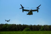 Two MV-22 Ospreys laden with Marines and equipment come in for a landing in a field aboard Marine Corps Base Quantico, Va., May 13, 2014. The Marines and equipment brought in were part of a noncombatant evacuation operation exercise conducted by Combat Logistics Battalion 2, 2nd Marine Logistics Group, II Marine Expeditionary Force. (U.S. Marine Corps photo by Cpl. Shawn Valosin)