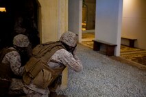 Marines with 2nd Supply Battalion, Combat Logistics Regiment 25, 2nd Marine Logistics Group hold a defensive position against simulated enemies during an infantry immersion training course aboard Camp Lejeune, N.C., May 15, 2014. The Marines reacted to hostile contact after arriving to simulate humanitarian assistance and disaster relief operations.