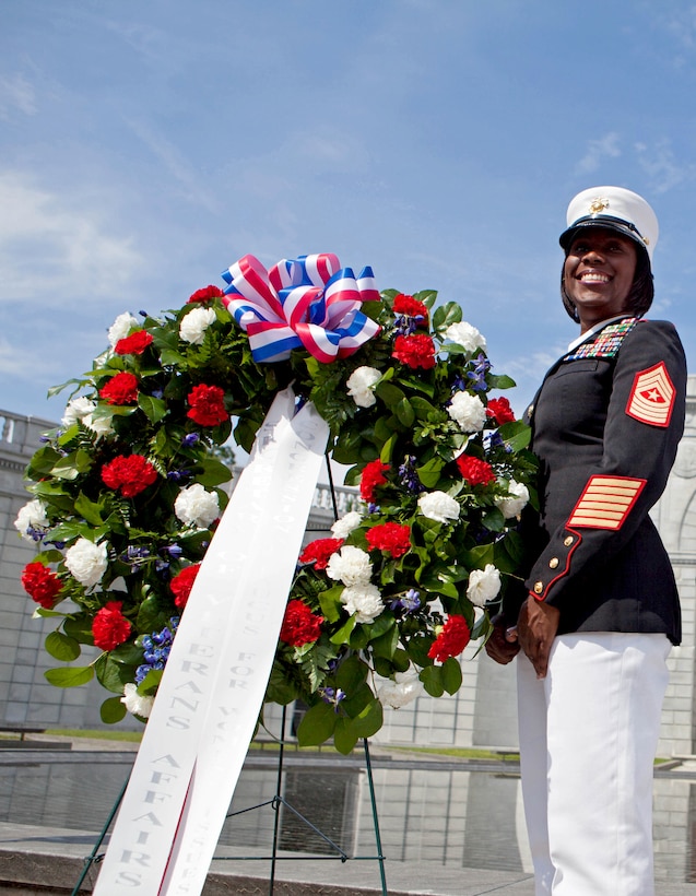 Sgt. Major Lanette Wright, the 24th Marine Expeditionary Unit sergeant major, was recognized by the Congressional Caucus for Woman's Issues during their military wreath laying ceremony at the Woman in Military Service for America Memorial in Arlington, Virginia, May 20, 2014. The ceremony was held in honor of military service women.