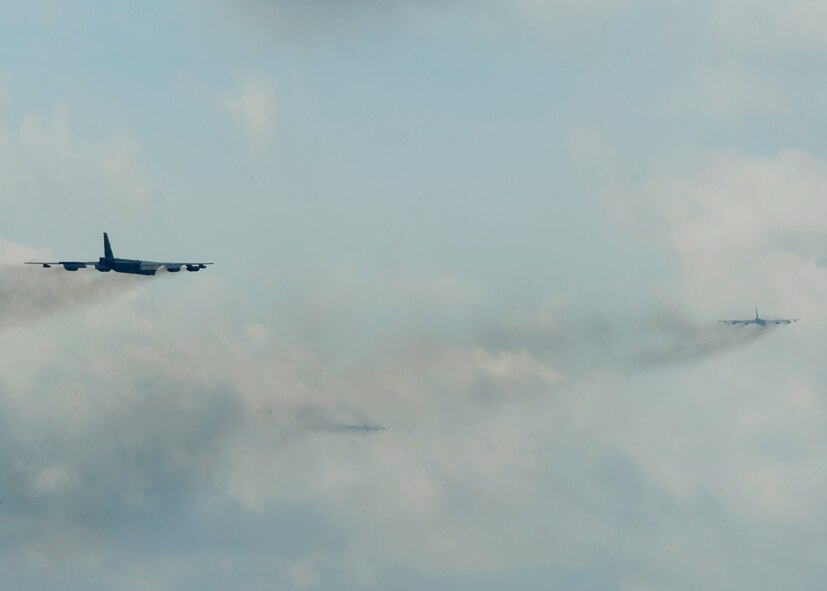B-52H Stratofortress strategic bombers participate in a Constant Vigilance minimum interval takeoff exercise at Barksdale Air Force Base, La., May 19, 2014. The MITO was executed in response to a simulated alert. The expedited launch procedure allows deterrent forces to respond as rapidly as possible in crisis, contingency, and wartime operations. (U.S. Air Force photo/Senior Airman Joseph A. Pagán Jr.) 