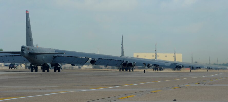 B-52H Stratofortress bombers taxi for minimum interval takeoffs at Barksdale Air Force Base, La., during exercise Constant VigilanceMay 19, 2014. MITO is an accelerated launch procedure which allows strategic bomber forces to respond as rapidly as possible when called upon. The long range and versatility of the B-52 makes it a weapon of choice for providing deterrence and demonstrating U.S. resolve in support of combat operations around the world. (U.S. Air Force photo/Senior Airman Joseph A. Pagán Jr.)
