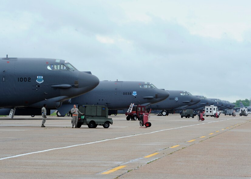 Crew chiefs prepare multiple B-52H Stratofortress? for missions while participating in Global Lightning/Constant Vigilance 2014 at Barksdale Air Base, La., May 13, 2014. Global Lightning exercises U.S. Strategic Command's ability to deter and detect strategic attacks against the U.S. and its allies, while Constant Vigilance exercises Air Force Global Strike Command's ability to support its conventional and nuclear missions. Air Force Global Strike Command supports both exercises simultaneously with both command and control elements as well operational units throughout the command. (U.S. Air Force photo/Senior Airman Joseph A. Pagán Jr.)