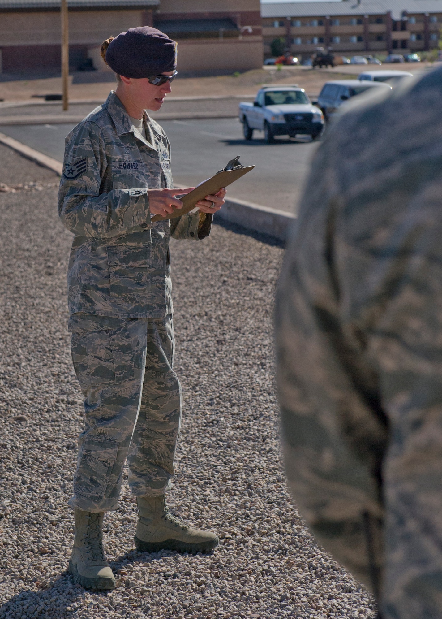 Staff Sgt. Alania Howard, 49th Security Forces Squadron duty position evaluator, reads memorandums from the President of the United States and the U.S. Gov. Susana Martinez of New Mexico addressing National Police Week at Holloman Air Force Base, N.M., May 12.  According to the National Police Week website, President John F.  Kennedy signed a proclamation in 1962 that designated May 15 as Peace Officers Memorial Day and the week in which that date falls as National Police Week.  Since the inception of National Police Week, the United States Air Force has lost 120 military and civilian law enforcement officers. (U.S. Air Force photo by Staff Sgt. E’Lysia Wray/Released)