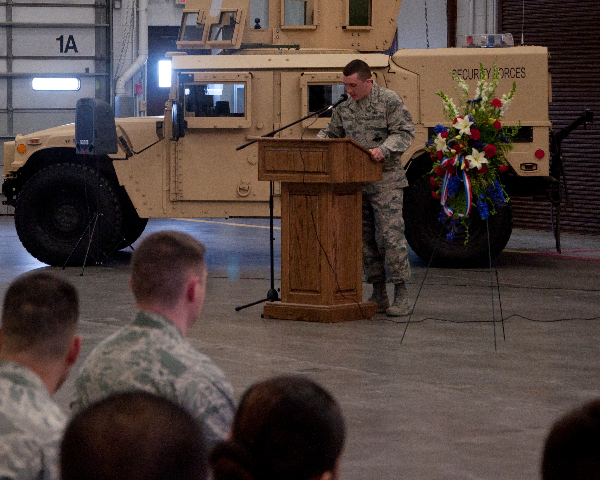 140516-F-BR137-001
Staff Sgt. Christopher Driskill, 90th Security Forces Group Standardization Evaluation evaluator, speaks to Airmen gathered in the Peacekeeper High Bay May 16, 2014, for a memorial and retreat ceremony for Air Force defenders who died in the line of duty. (U.S. Air Force photo by Airman 1st Class Jason Wiese)
