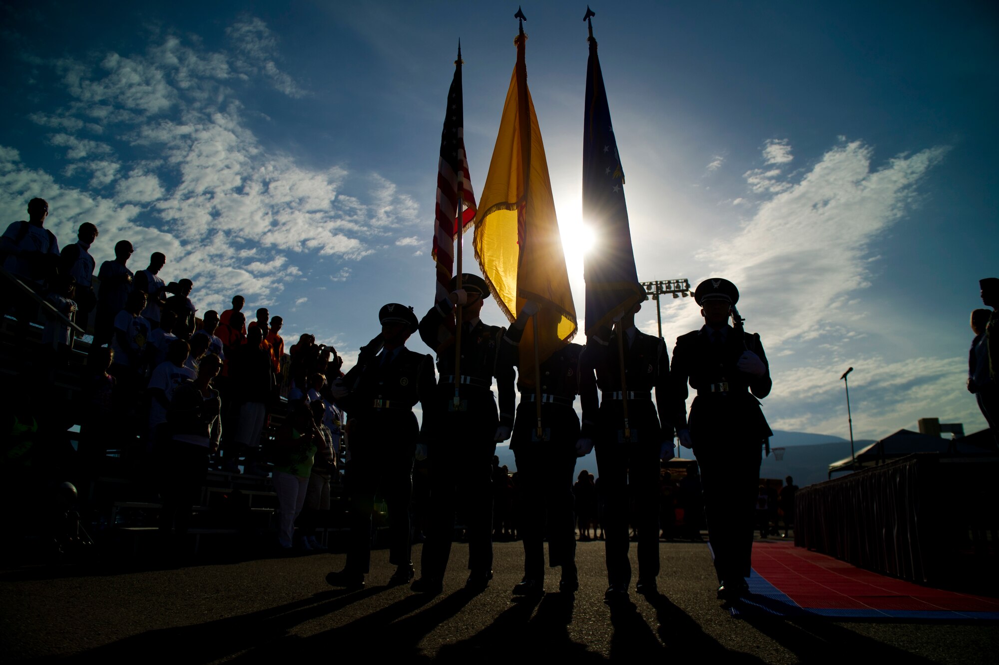 Members of the Steel Talons Honor Guard present the colors during the opening ceremony of the Armed Forces Day Gus Macker 3-on-3 Basketball Tournament at Alamogordo, N.M., May 17. Airmen from Holloman Air Force Base, N.M., provided a model aircraft static display to showcase the missions to visitors. Armed Forces Day is celebrated annually on the third Saturday of May to pay tribute to men and women who serve in the United States armed forces. (U.S. Air Force photo by Airman 1st Class Aaron Montoya / Released)