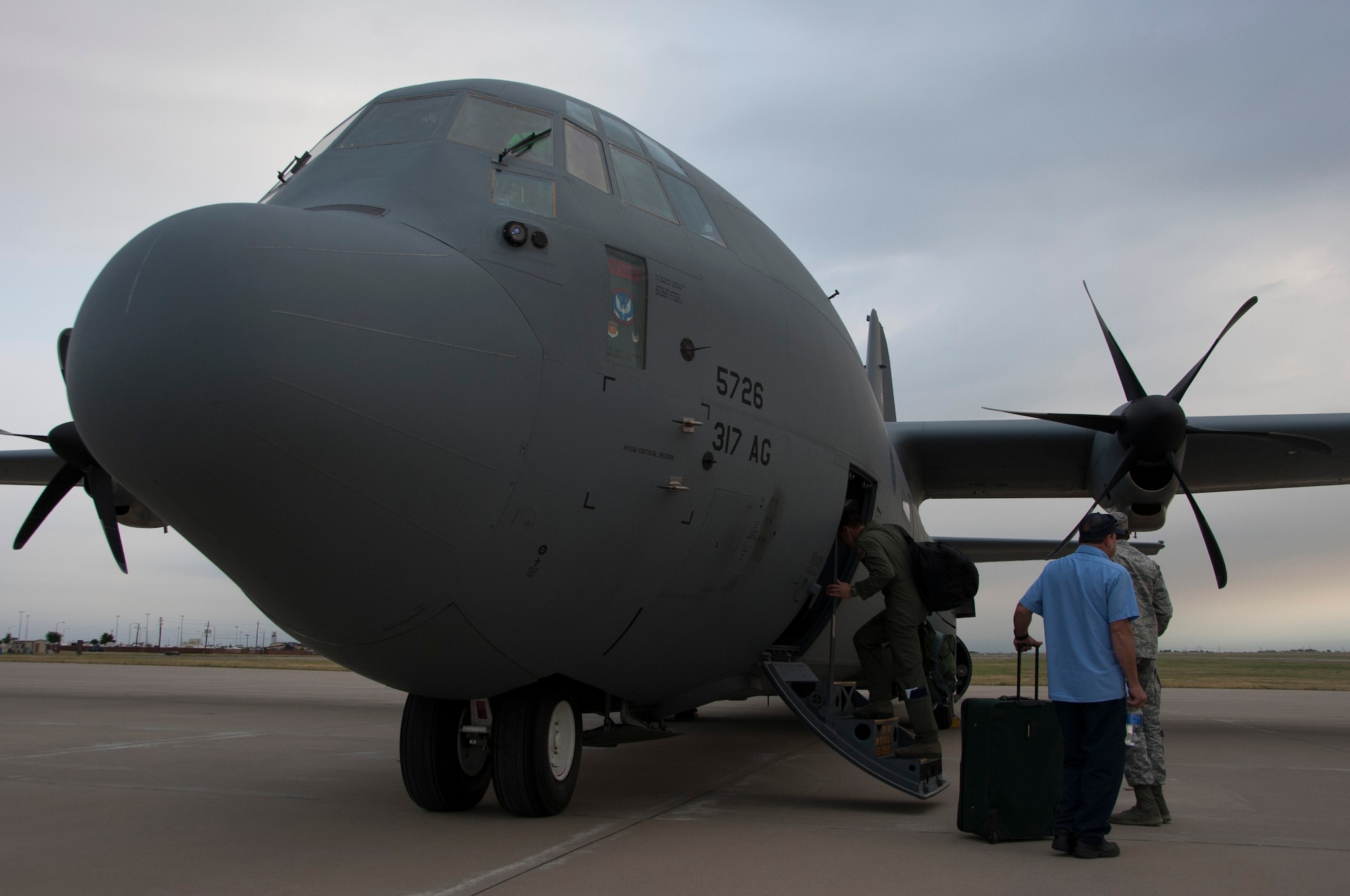 Pilots and aircraft maintainers grasp their luggage and climb aboard a C-130 Hercules May 12, 2014, Sheppard Air Force Base, Texas. Through the help of Dyess AFB, Texas and Atlus AFB, Okla., members of Sheppard’s own 88th Fighter Training Squadron were able to make the trip down to Florida to provide air-to-air combat simulation presentations for the Florida Air National Guard. The trip provides training to both the FANG and the instructor pilots from Sheppard AFB, Texas. (U.S. Air Force photo/Airman 1st Class Robert L. McIlrath)





 

