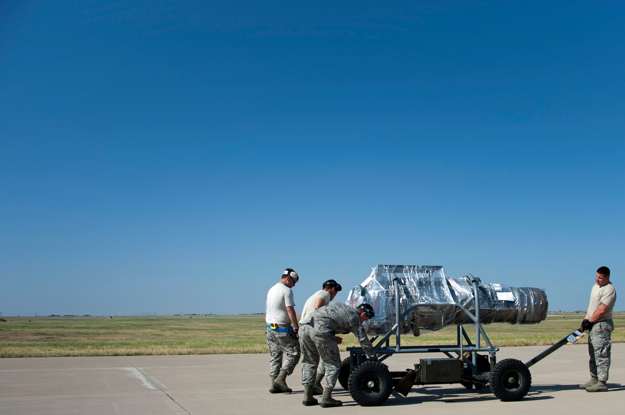 Airmen from Altus Air Force Base, Okla., pitched in to help load and inspect equipment and tools onto a C-130 Hercules supplied by Dyess AFB, Texas, May 11, 2014. Through the help of Dyess and Atlus, members of Sheppard’s own 88th Fighter Training Squadron were able to make the trip down to Florida to provide air-to-air combat simulation presentations for the Florida Air National Guard. The trip provides training to both the FANG and the instructor pilots from Sheppard AFB, Texas. (U.S. Air Force photo/Airman 1st Class Robert L. McIlrath)





 


