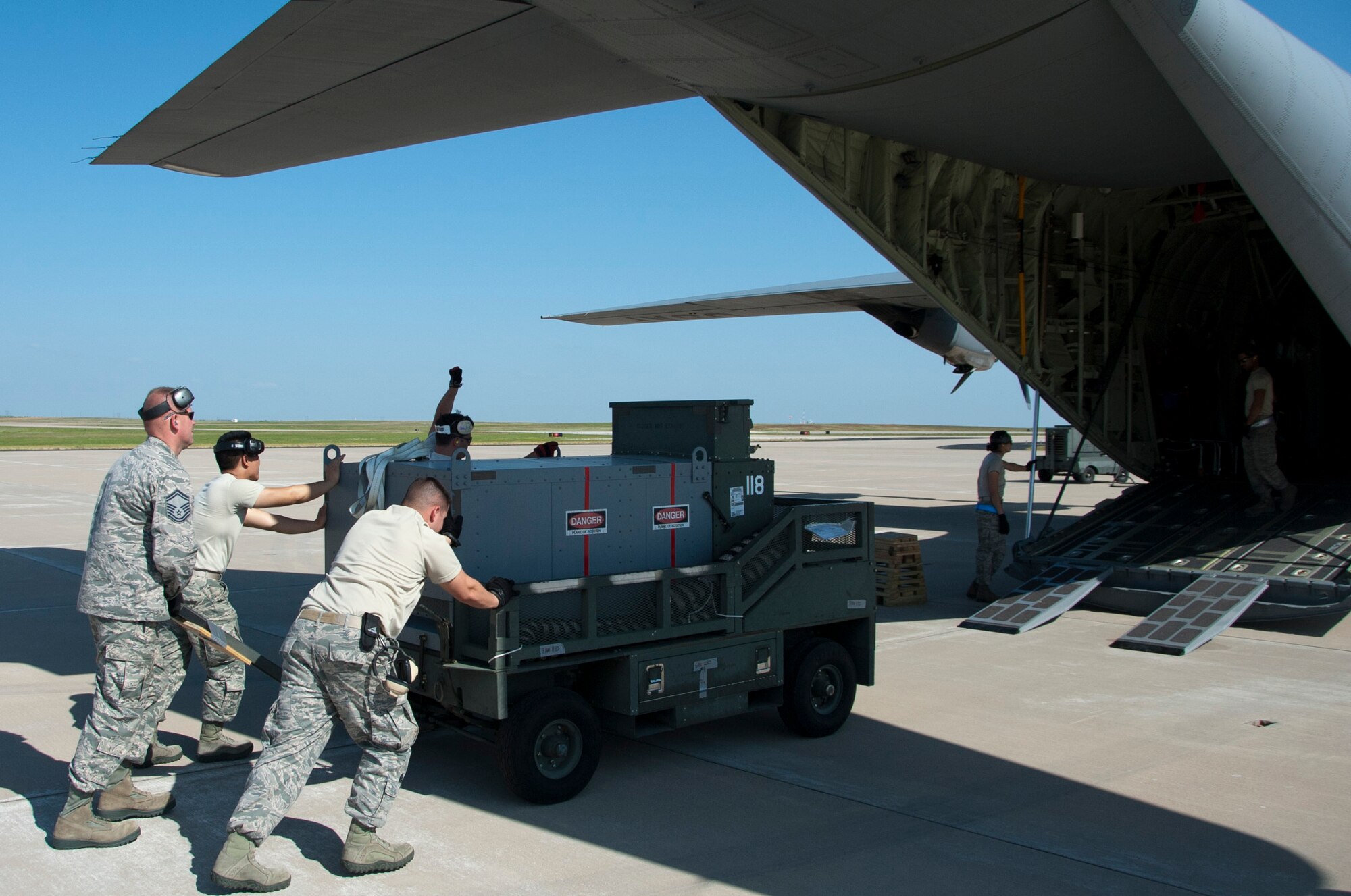 Airmen from Altus Air Force Base, Okla., pitched in to help load and inspect equipment and tools onto a C-130 Hercules supplied by Dyess AFB, Texas, May 11, 2014. Through the help of Dyess and Atlus, members of Sheppard’s own 88th Fighter Training Squadron were able to make the trip down to Florida to provide air-to-air combat simulation presentations for the Florida Air National Guard. The trip provides training to both the FANG and the instructor pilots from Sheppard AFB, Texas. (U.S. Air Force photo/Airman 1st Class Robert L. McIlrath)





 

